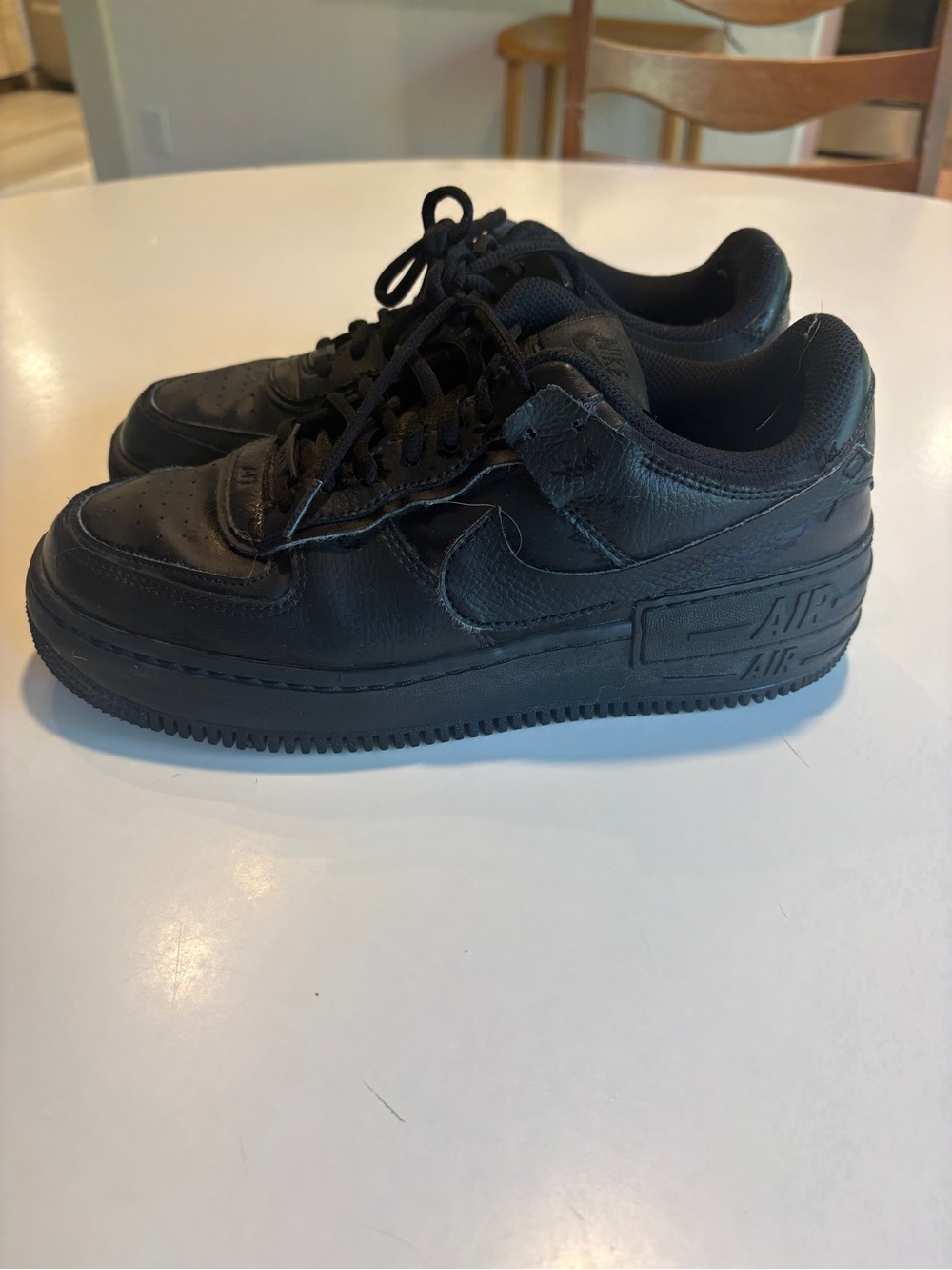 Nike Men’s Air Force 1 Low All-Black Leather Sneakers